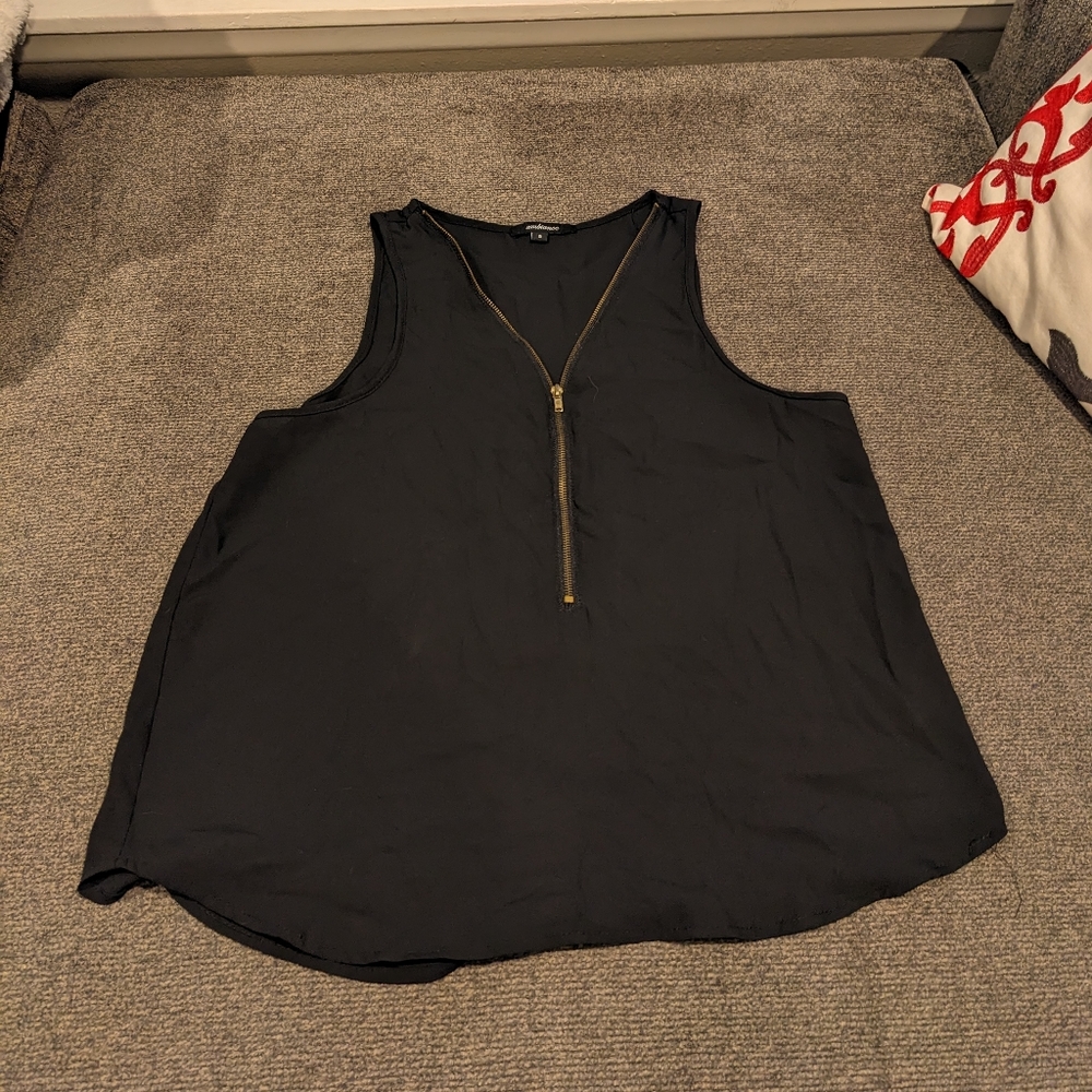 Black zip-up sleeveless top
